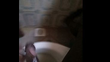 masturbating and cumming in the bathroom
